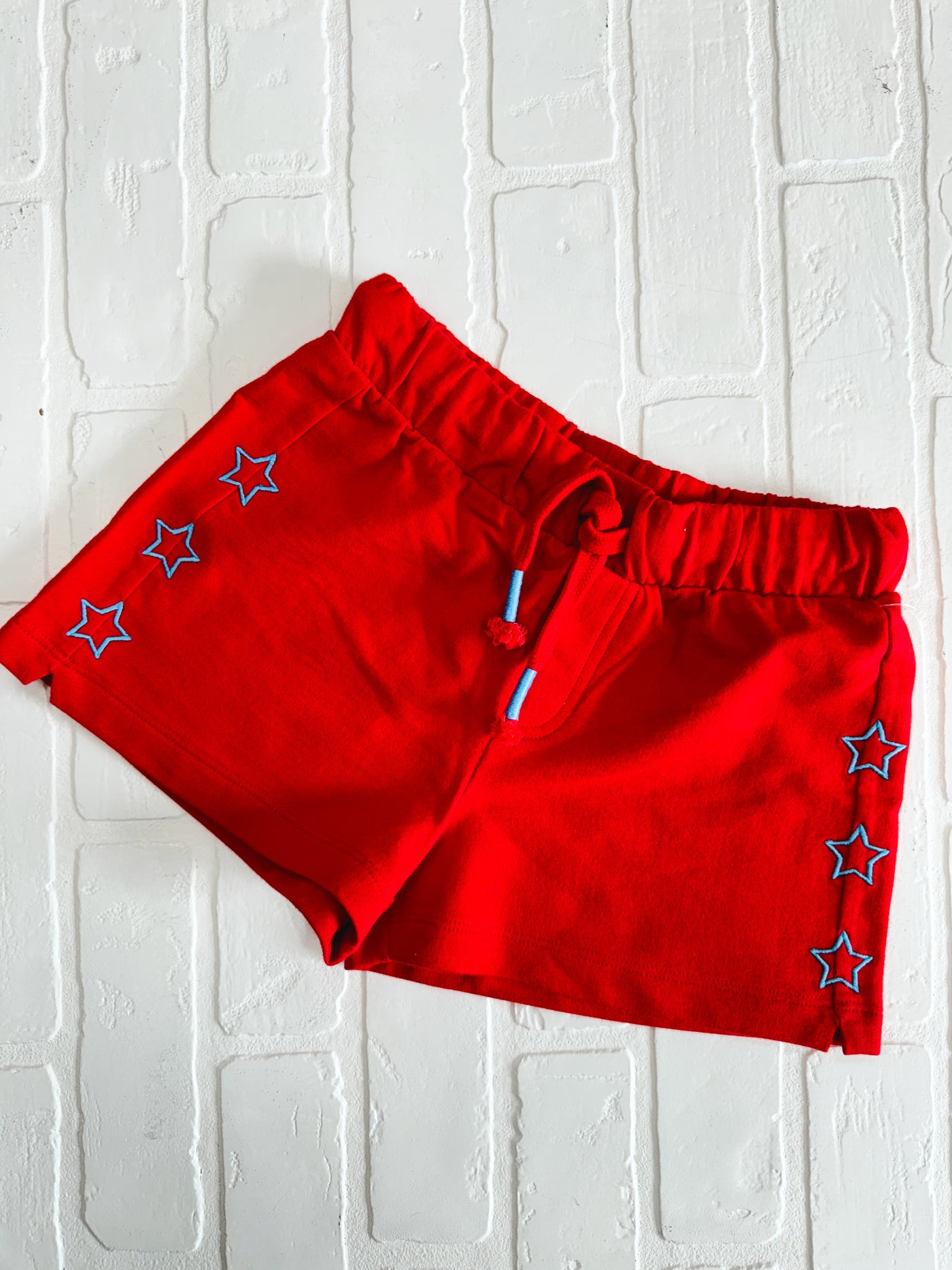 red short with blue stars