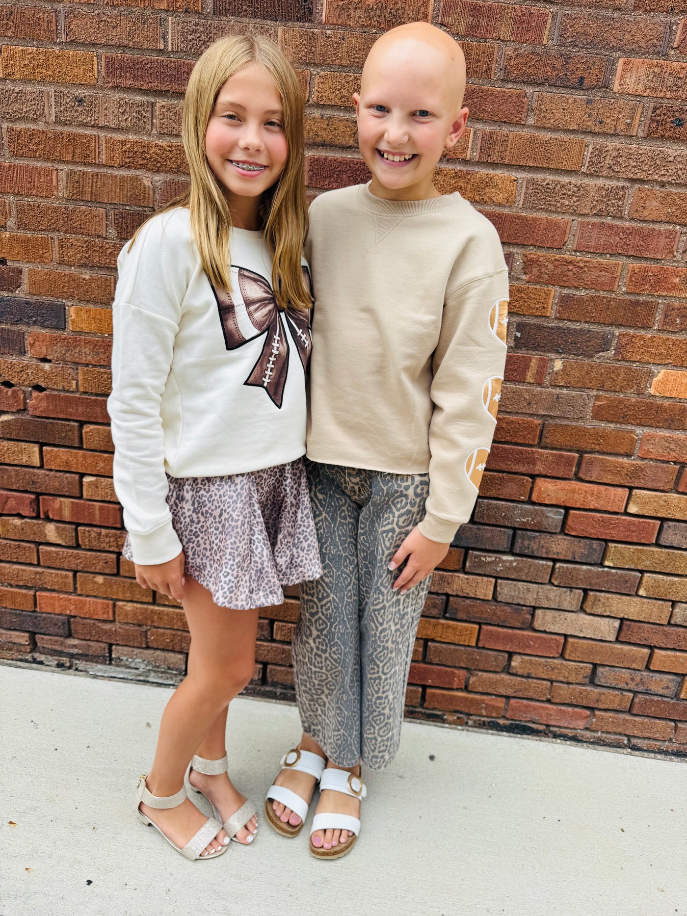 bow patch football sweatshirt