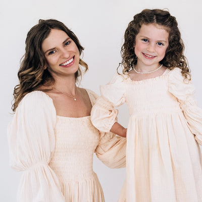 ivory nmuslin puffed sleeve dress