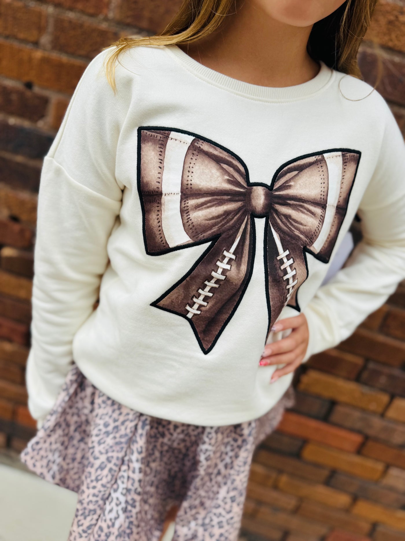 bow patch football sweatshirt