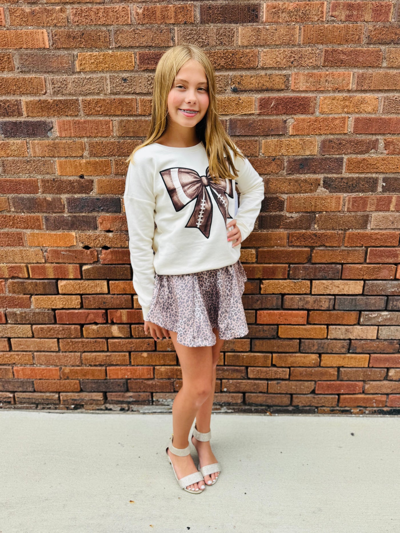 bow patch football sweatshirt