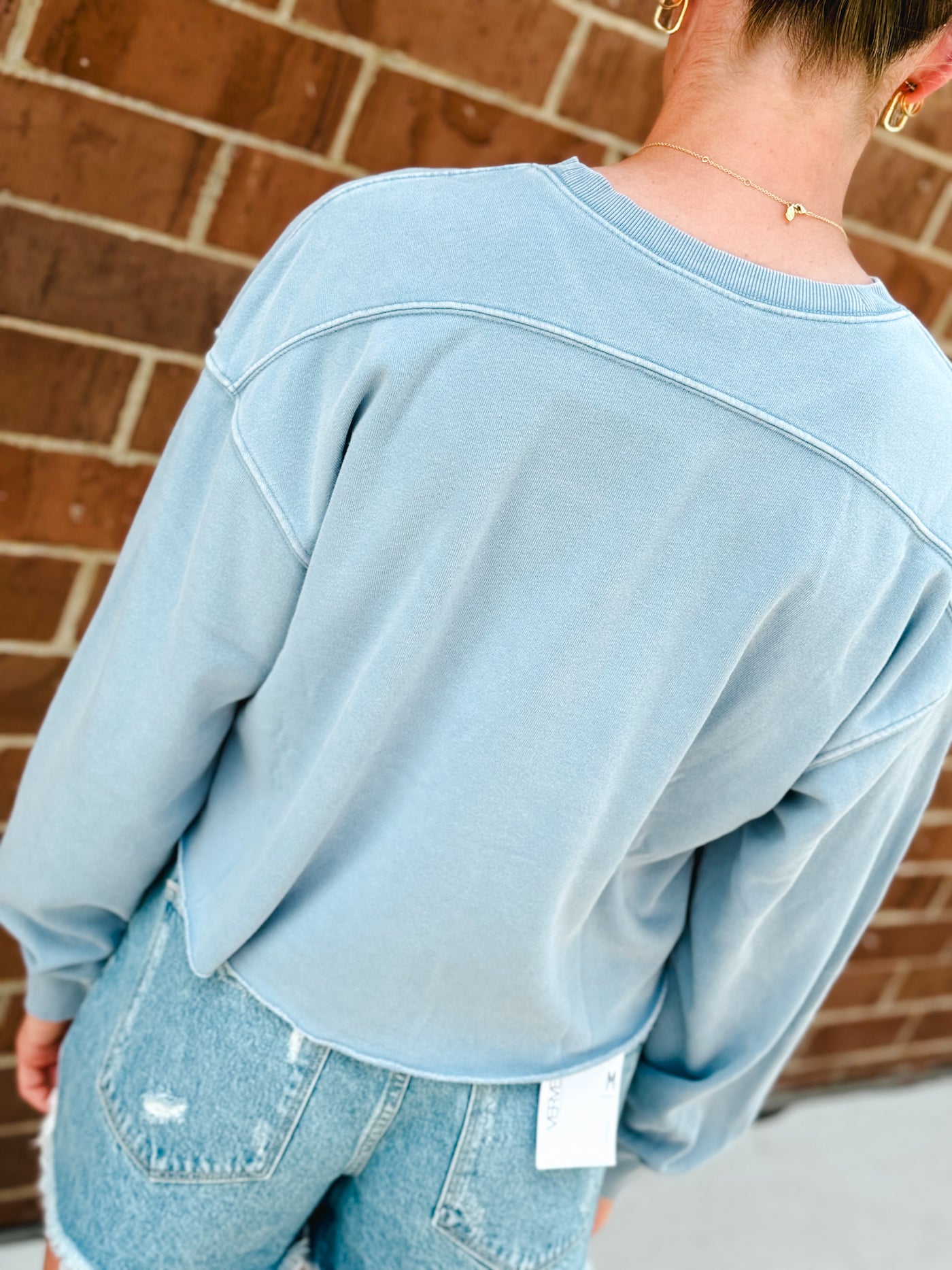 blue cropped crewneck sweatshirt w/ raw hem