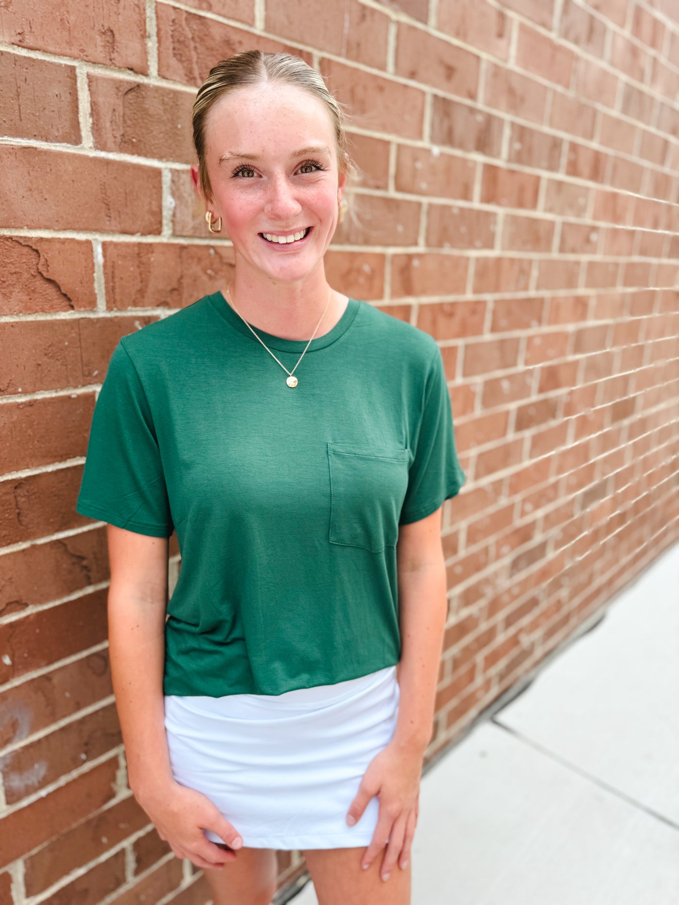 dark green crew neck pocket top