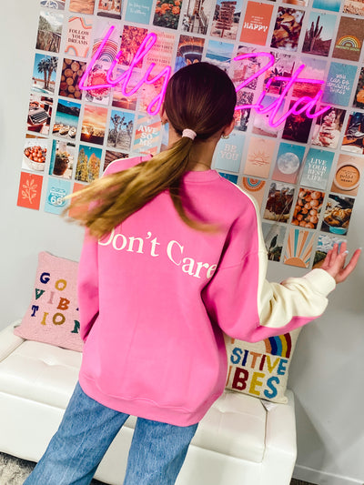 cream/pink don't know don't care crewneck