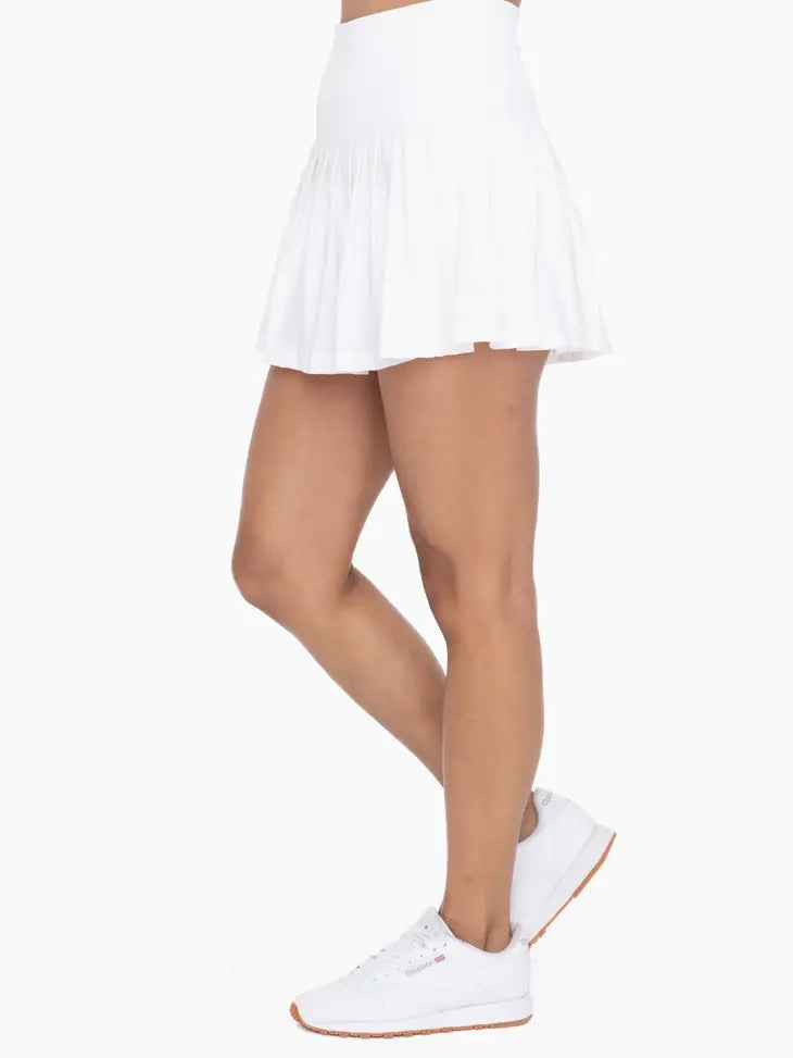 white pleated tennis skort