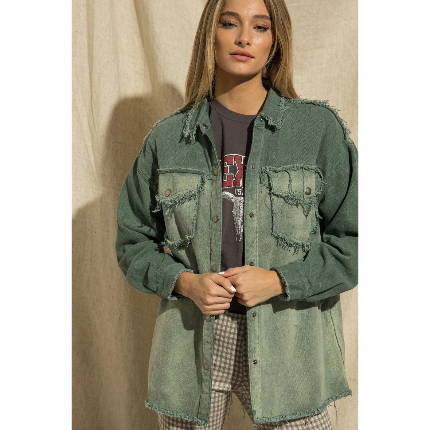 jade button up jacket with distressed hem detail
