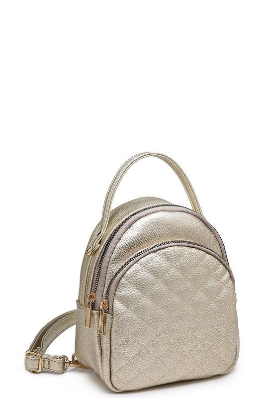 quilted convertible champagne back pack