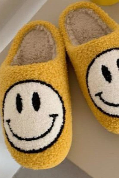 happy face yellow slippers