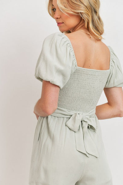 sage puff sleeve knotted romper