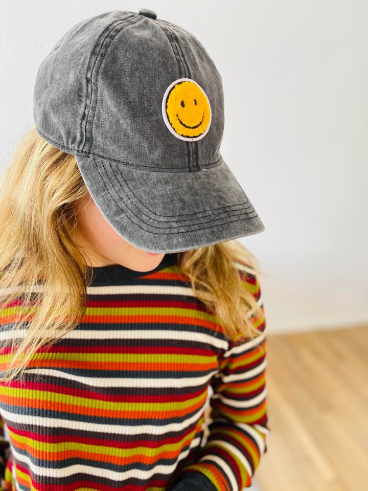 black sherpa smiley face hat