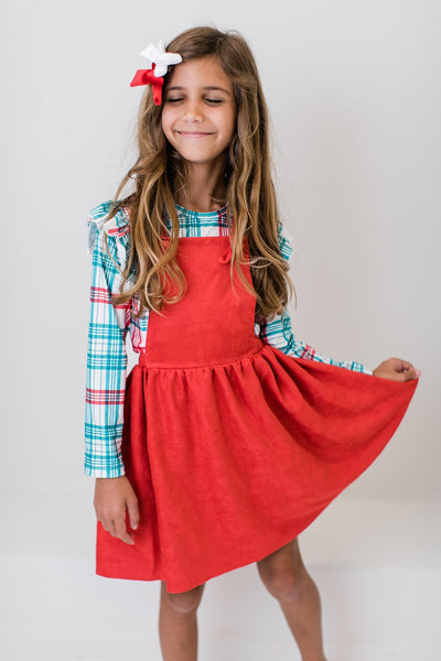 red pinafore
