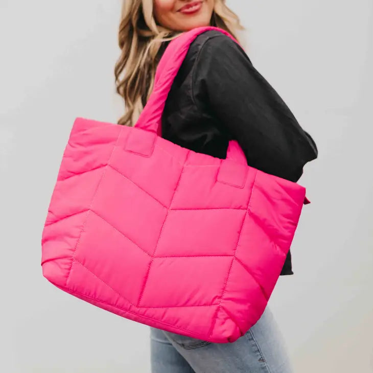 naomi pink puffer bag
