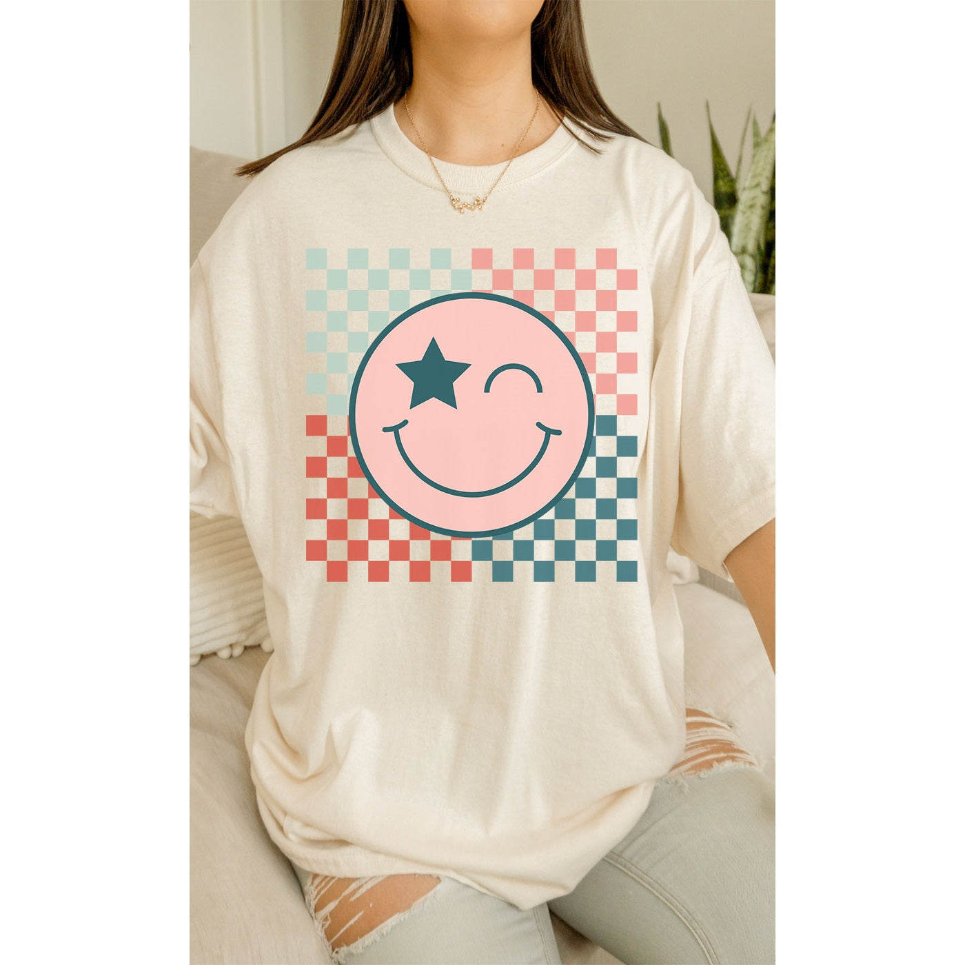 checkerboard happy face oversized graphic tee
